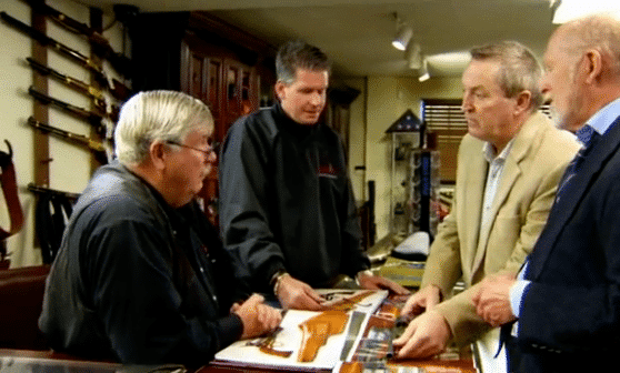 R.L. Wilson and Steve Fjestad examining the firearms.
